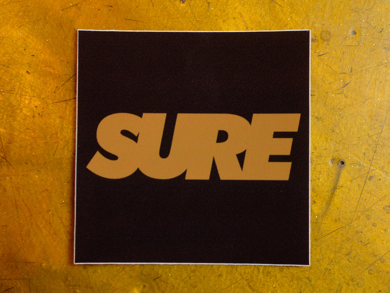 Banner Square Sticker 3" - Black / Bronze